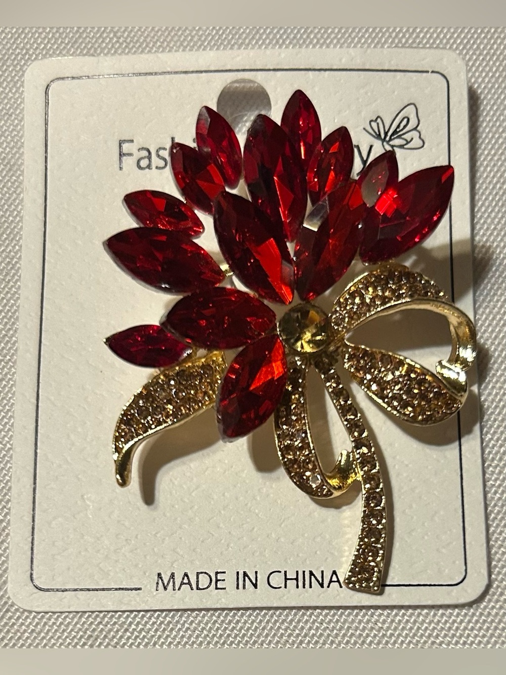 Fashion Jewelry Red Crystal Floral Brooch with Gold Bow